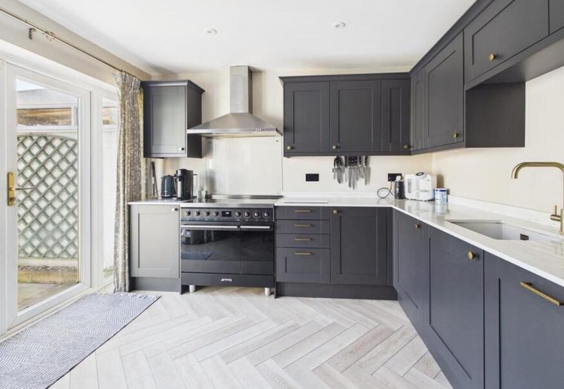 Kitchen left clear and clean at the end of a tenancy, cooker and worktops finished