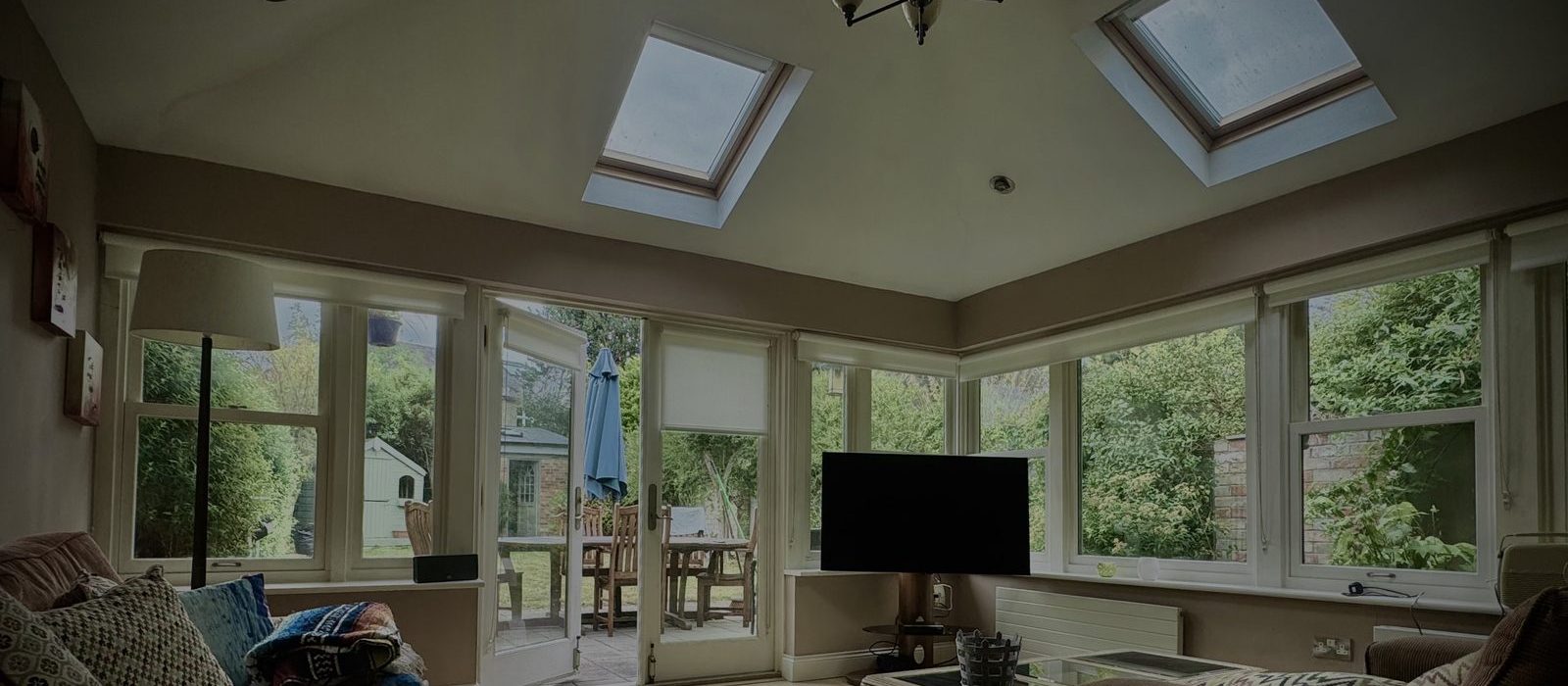 Sunroom with glazing on every wall and two roof lights, cleaned inside